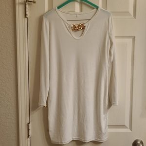 White dress with chain decoration